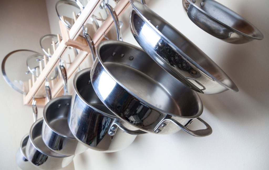20 Great Small Kitchen Design Ideas 11 Install a pot rack if you don't have enough cabinet storage