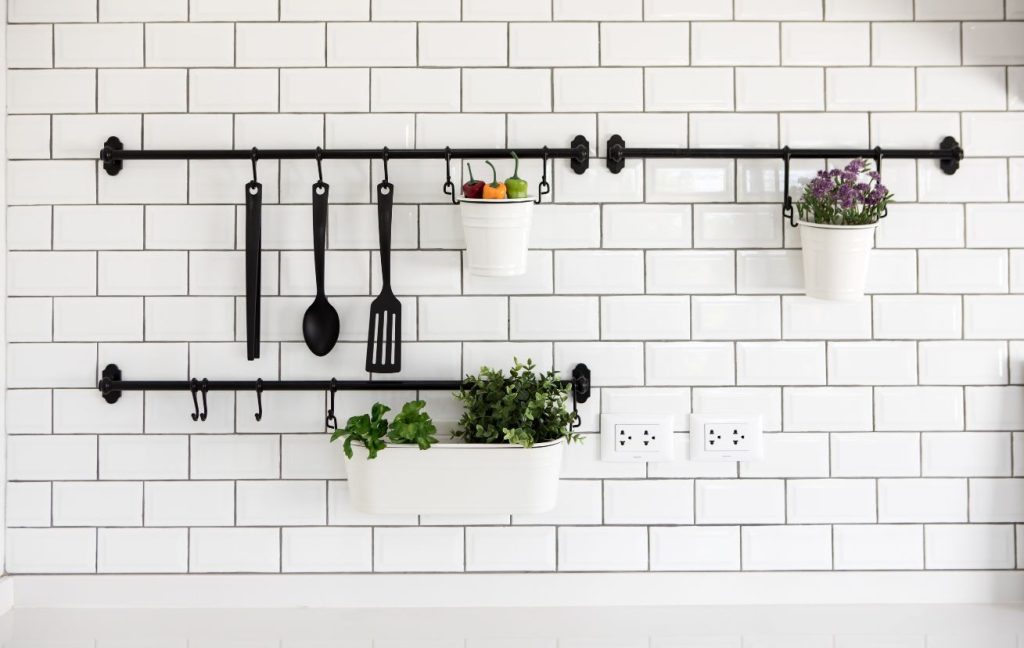20 Great Small Kitchen Design Ideas 10 Create additional storage with a tension rod and s-shape hooks