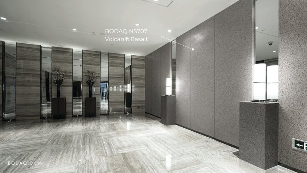 Transforming Hotels with Bodaq Finishes 13 NS707 Volcanic Basalt applied to the lobby walls.