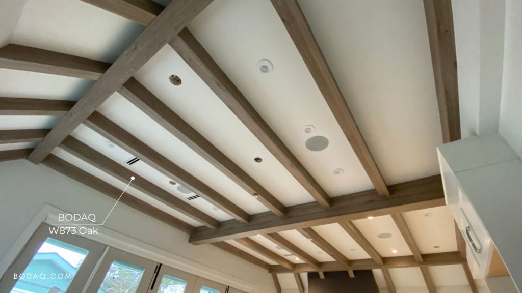 Interior Design Trends Moving into 2024 5 Transform any space with Bodaq Interior Film. W873 Oak on ceiling beams