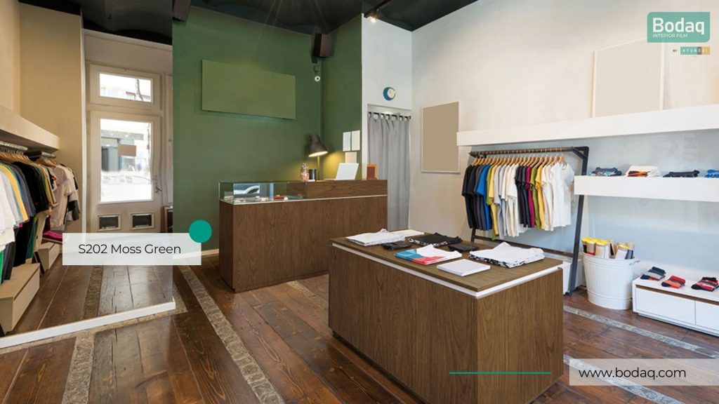 Go Green With Bodaq Interior Film 3 S202 Moss Green on a feature wall at a store
